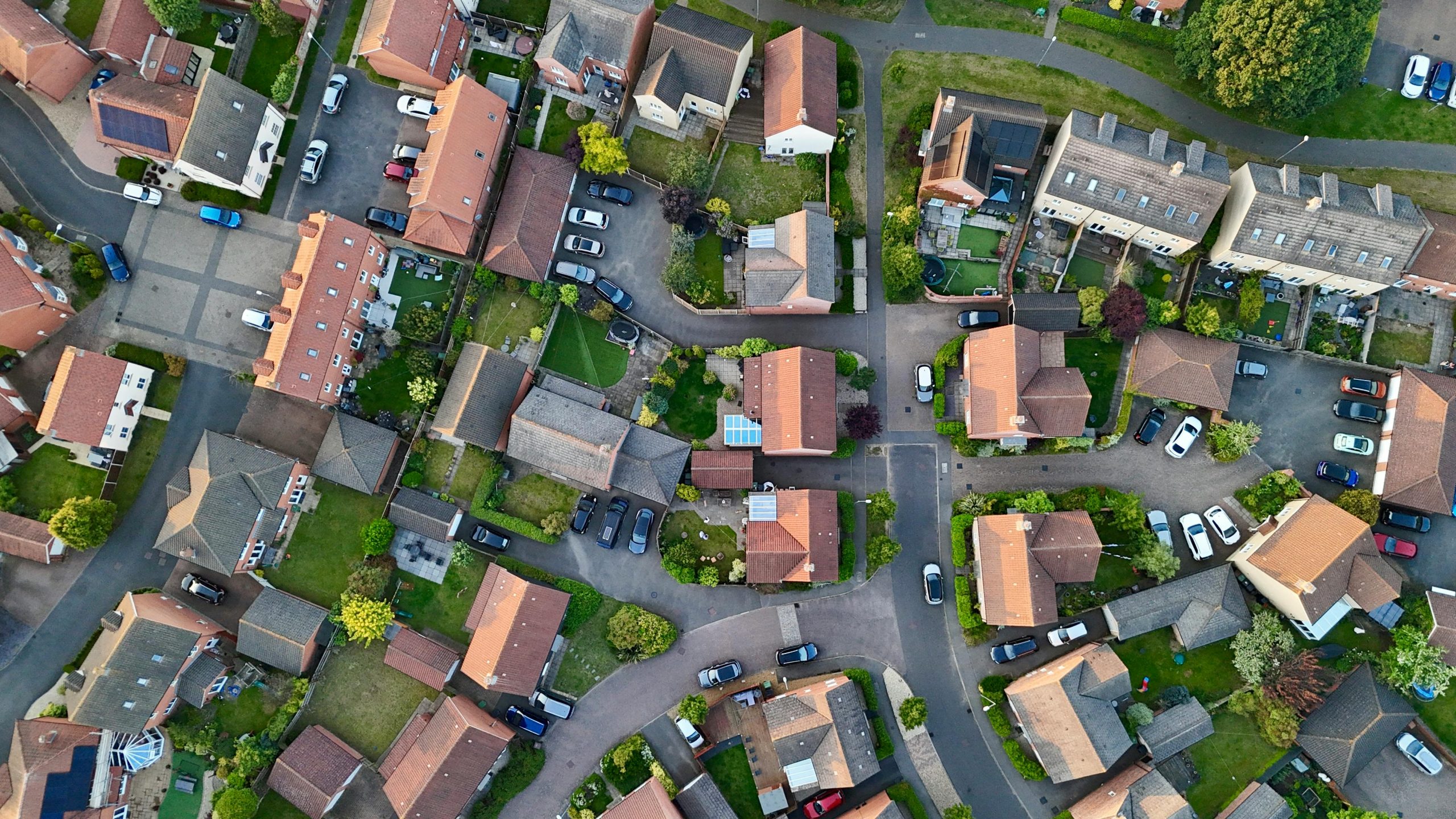 Aerial shot showcasing the charming layout of suburban houses in Cringleford, England.